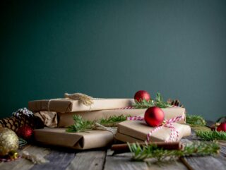gifts gift boxe with red baubles on top