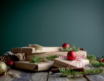 gifts gift boxe with red baubles on top
