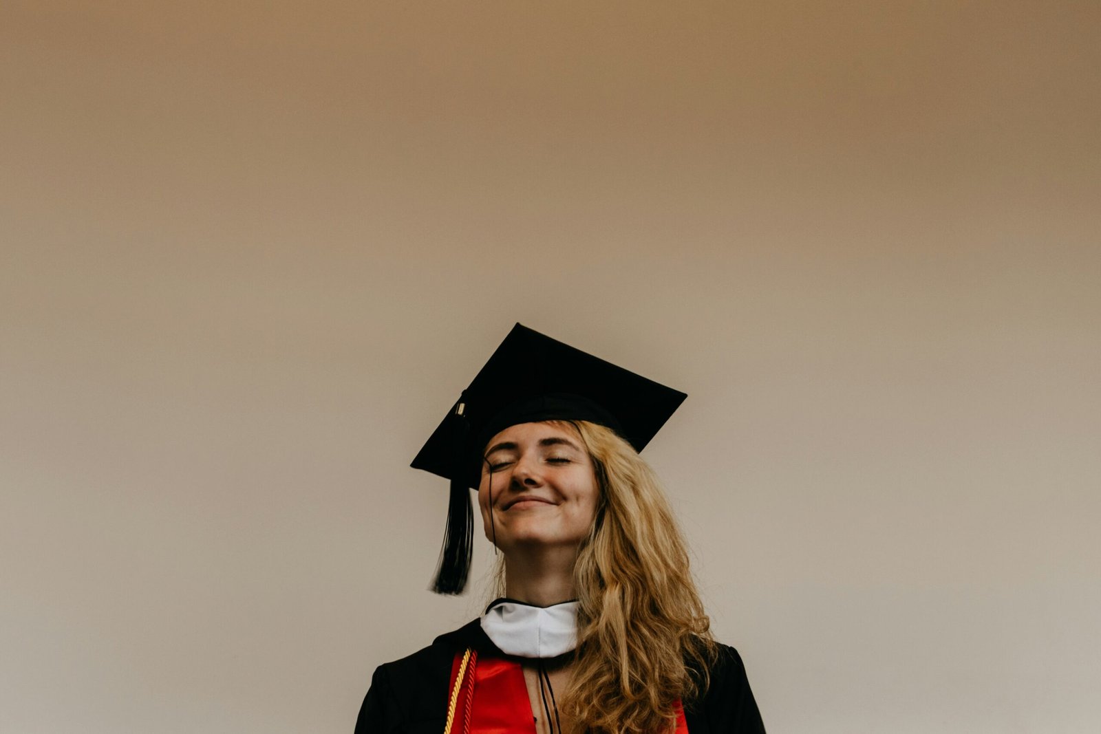a lady in graduation dress